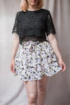 Maelia Floral Short Skirt with Fabric Belt | Boutique 1861 on model