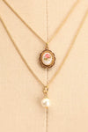 Patti Lupone Golden Frame & Pearl Pendant Necklace on mannequin close-up | Boutique 1861