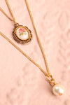Patti Lupone Golden Frame & Pearl Pendant Necklace flat lay close-up | Boutique 1861