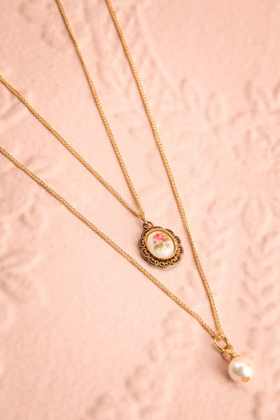 Patti Lupone Golden Frame & Pearl Pendant Necklace flat-lay | Boutique 1861