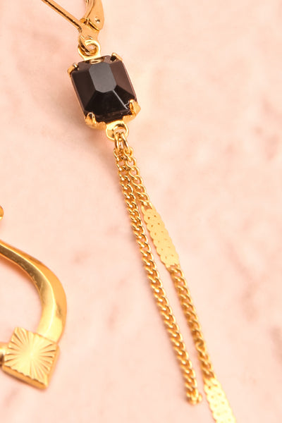 Paulettine Onyx Golden & Black Pendant Earrings flat close-up | Boutique 1861