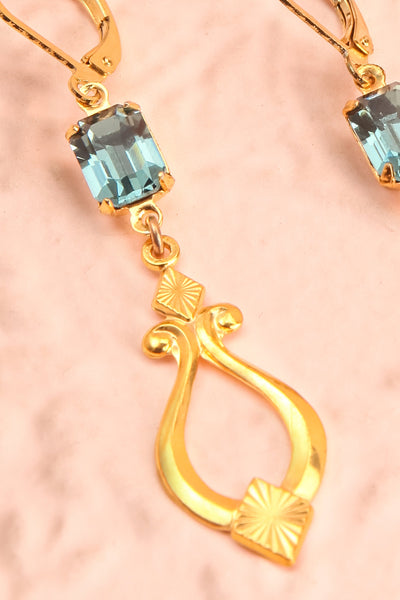 Paulettine Topaz Golden & Blue Pendant Earrings close-up | Boutique 1861
