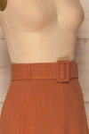 Pelczyce Rust Flared Midi Skirt w/ Belt side close up | La petite garçonne
