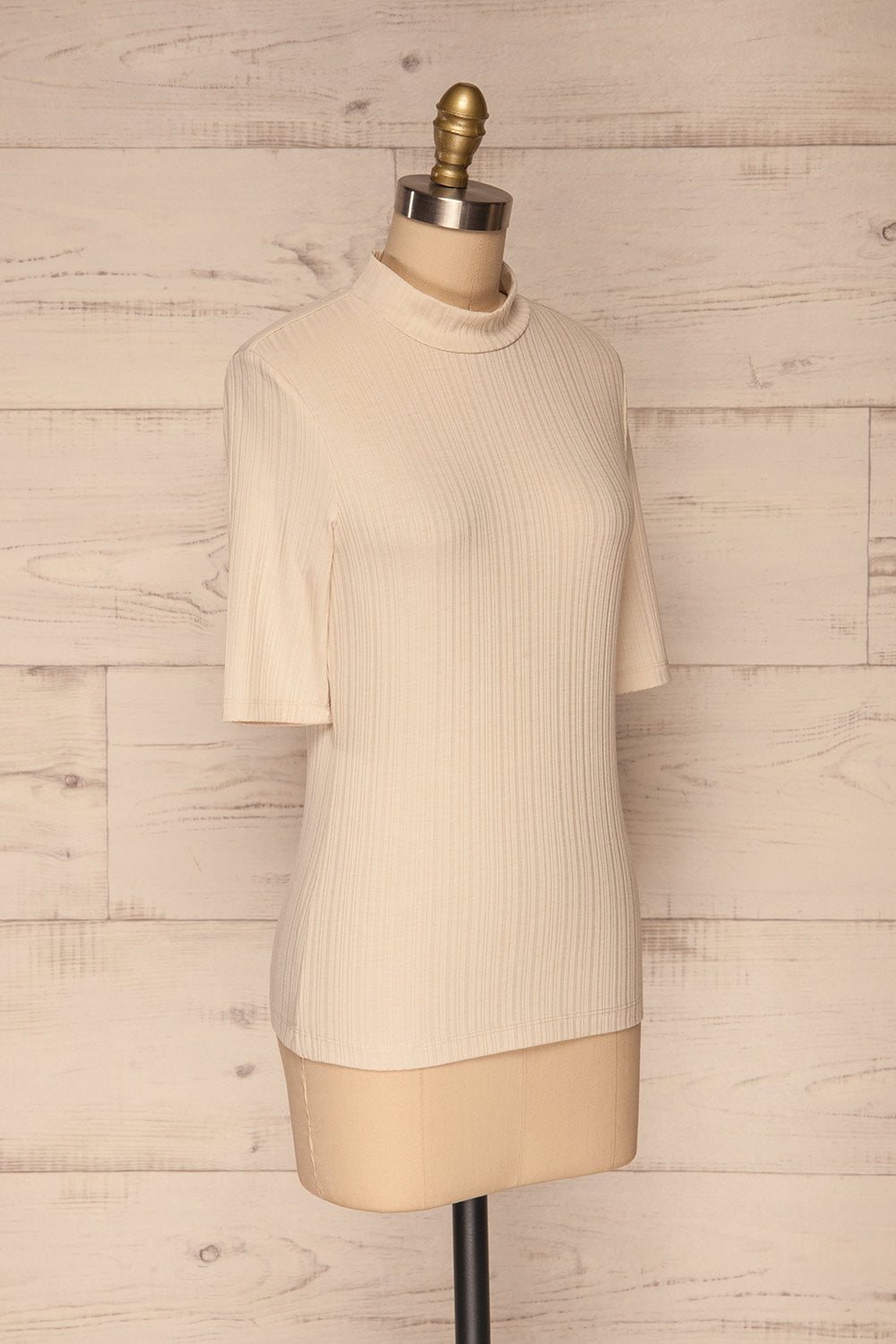 Pieszyce Cream White Mock Neck Top side view | La petite garçonne