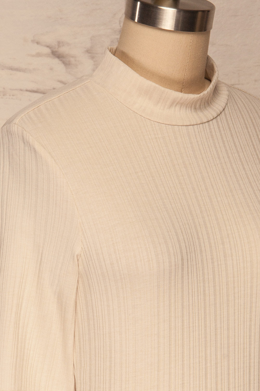 Pieszyce Cream White Mock Neck Top side close up | La petite garçonne