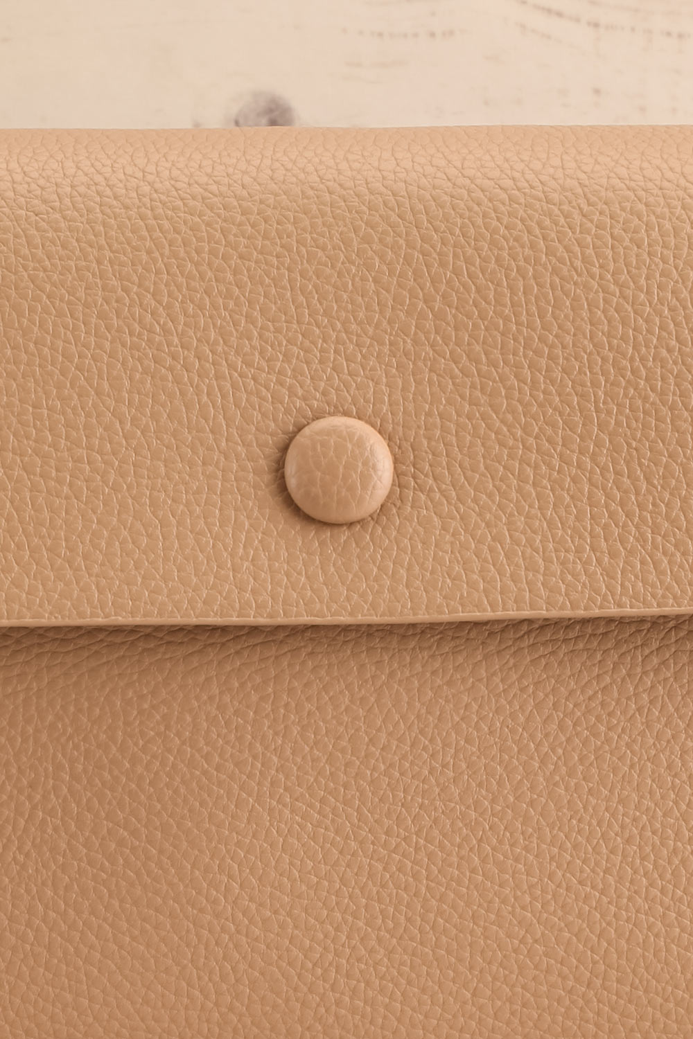 Puppis Taupe Textured Faux-Leather Handbag | La petite garçonne front close-up