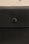 Puppis Black Textured Faux-Leather Handbag | La petite garçonne front close-up