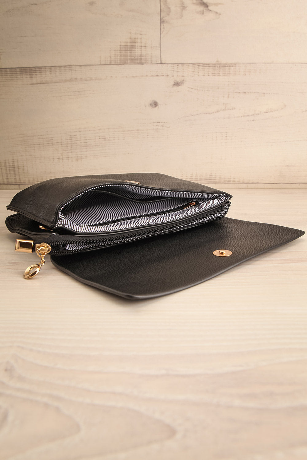 Puppis Black Textured Faux-Leather Handbag | La petite garçonne inside