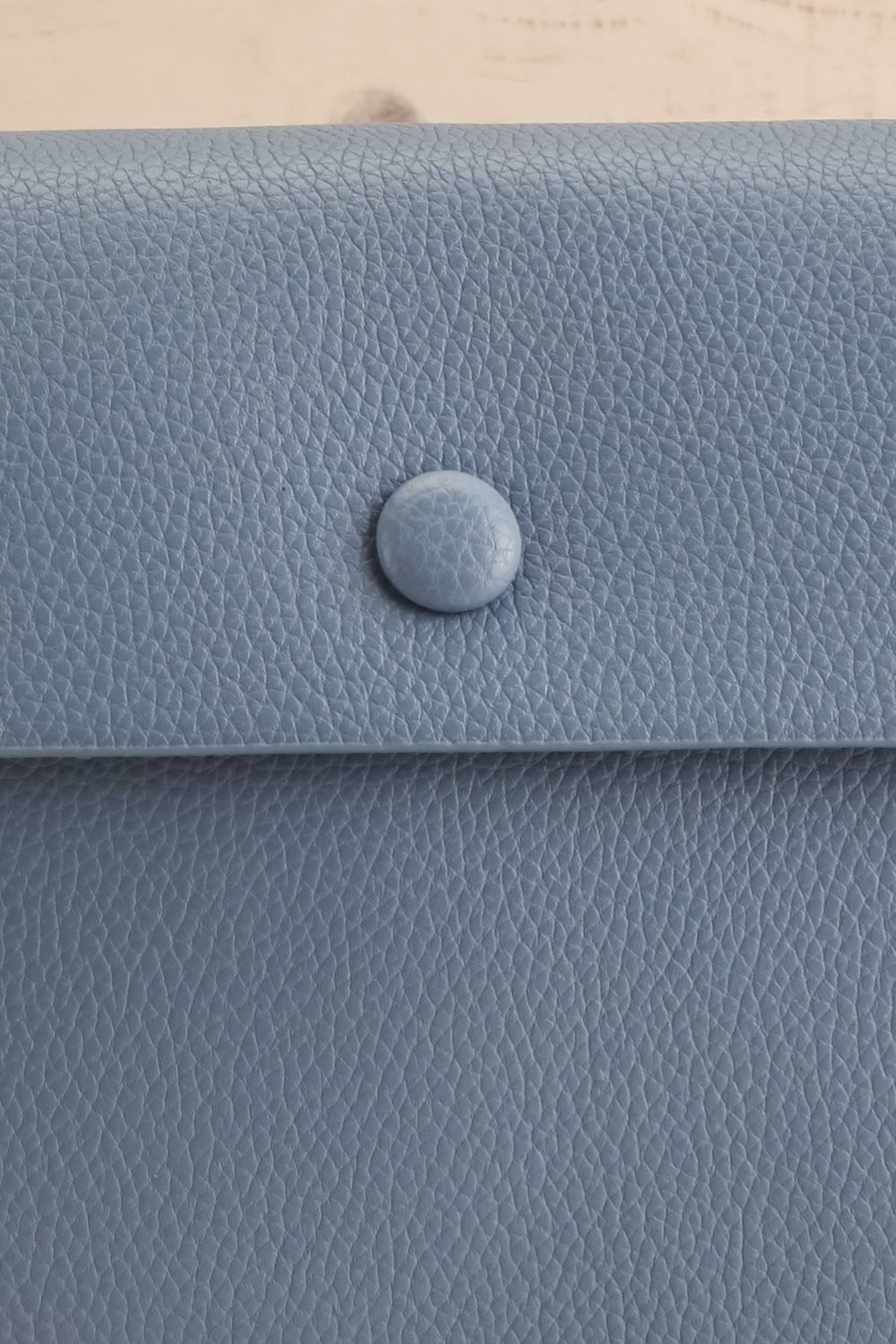 Puppis Blue Textured Faux-Leather Handbag | La petite garçonne front close-up