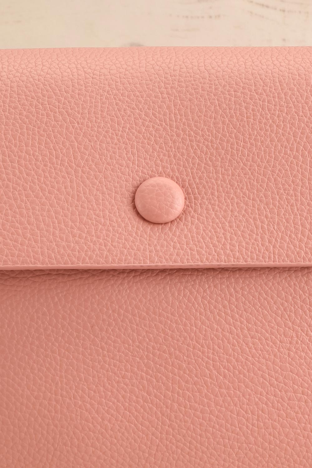 Puppis Blush Textured Faux-Leather Handbag | La petite garçonne front close-up