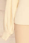 Recz Ivory Faux-Wrap Knit Top | La petite garçonne bottom