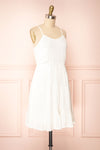 Reeta White Sleeveless Tiered Short Dress | Boutique 1861  side view