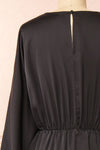 Reneane Black Long Sleeve Midi A-Line Dress | Boutique 1861 back close-up