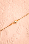 Renée Claire Golden Pendant Necklace | Fleur | Boutique 1861 closure close-up