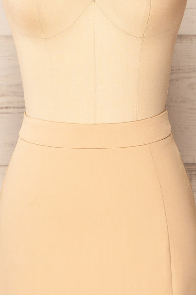 Rivas Beige Short Skirt with Slit | La petite garçonne front close-up