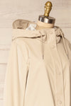 Rochester Beige Button Up Hooded Raincoat | La petite garçonne side close-up