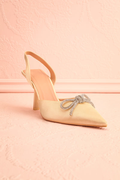 Sentiment Ivory Satin Pointed-Toe Heels w/ Sequin Bow | Boutique 1861 front view