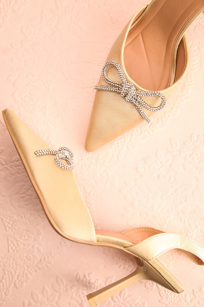 Sentiment Ivory Satin Pointed-Toe Heels w/ Sequin Bow | Boutique 1861 flat view