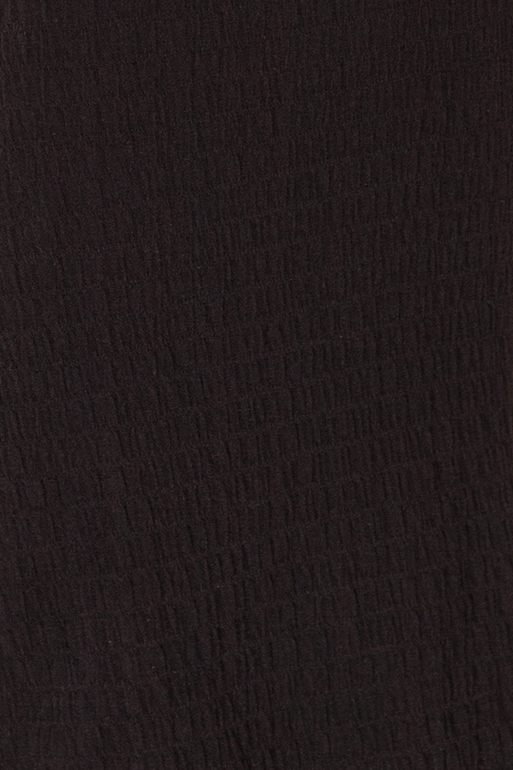 Serpa Black Fitted Ruched Dress with Ruffles | La petite garçonne fabric 
