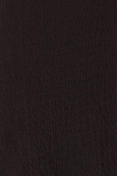 Serpa Black Fitted Ruched Dress with Ruffles | La petite garçonne fabric
