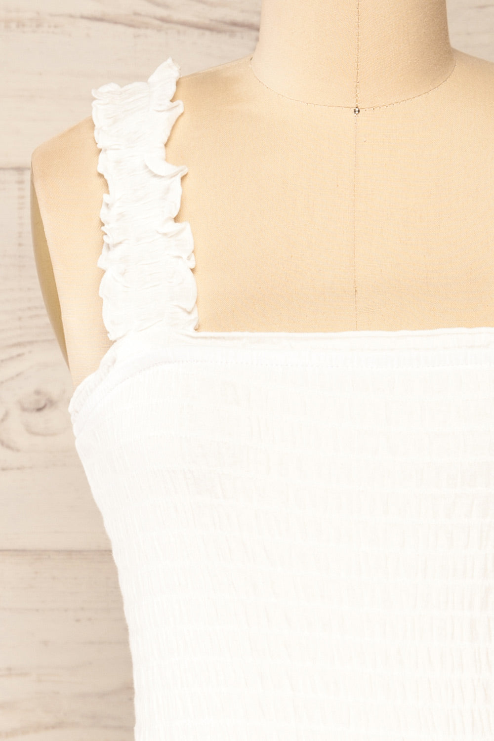 Serpa White Fitted Ruched Dress with Ruffles | La petite garçonne front close-up