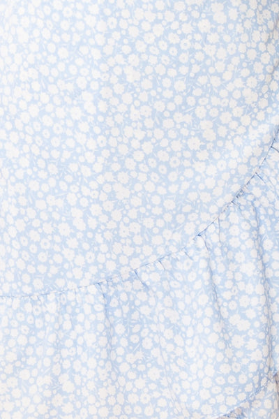 Stevette Blue Short Faux-Wrap Dress w/ Ruffles | Boutique 1861 texture