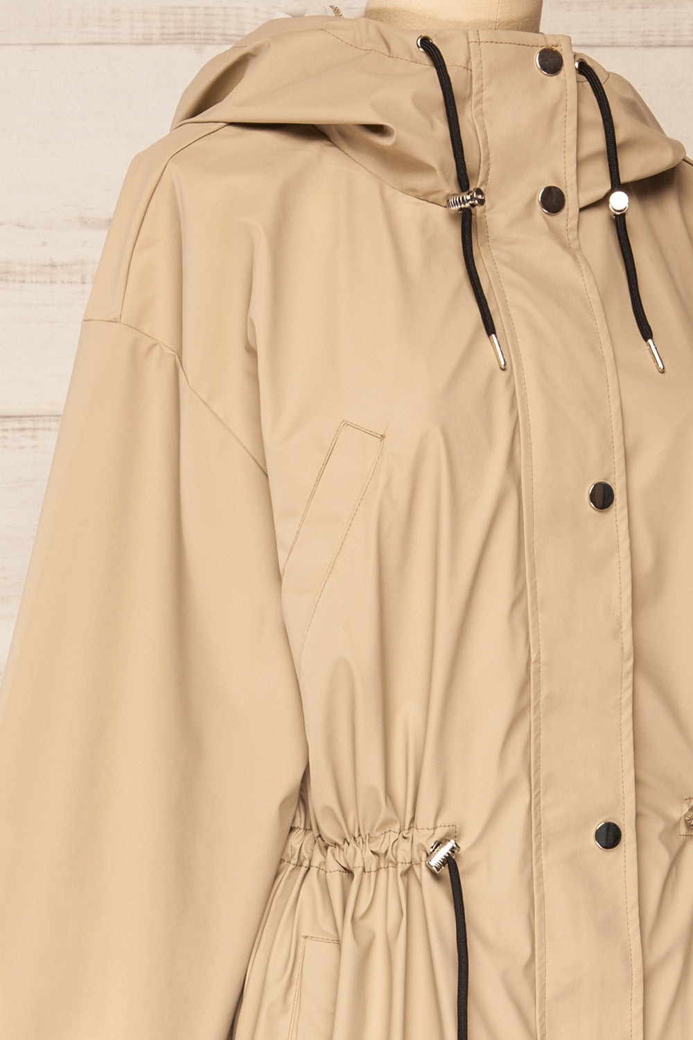 Tchekaline Hooded Raincoat w/ Drawstring | La petite garçonne side close-up