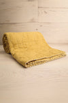 Tegue Chartreuse Yellow Quilted Throw Blanket | La petite garçonne rolled