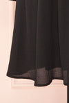 Tenzi Black Long Sleeve Short Dress w/ Buttons | Boutique 1861 bottom