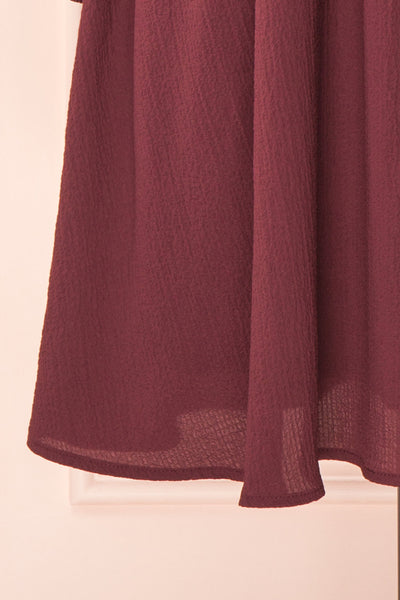 Tenzi Burgundy Long Sleeve Short Dress w/ Buttons | Boutique 1861 bottom