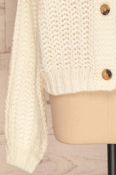 Tioumen Ivory Chunky Knit Button-Up Cardigan sleeve close up | La Petite Garçonne