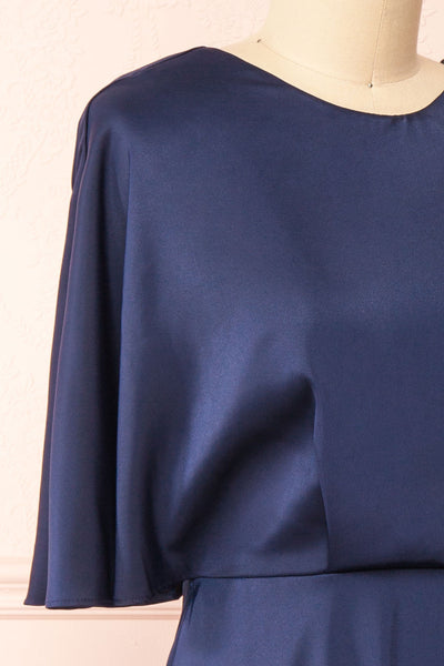 Tordis Navy Satin Midi Dress w/ Bell Sleeves | Boutique 1861 side close-up