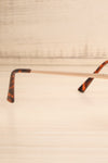 Toula Gold Aviator Sunglasses | La petite garçonne branch close-up