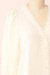 Tuleric Beige Button-up Blouse w/ Lace Detailing | Boutique 1861 side close-up