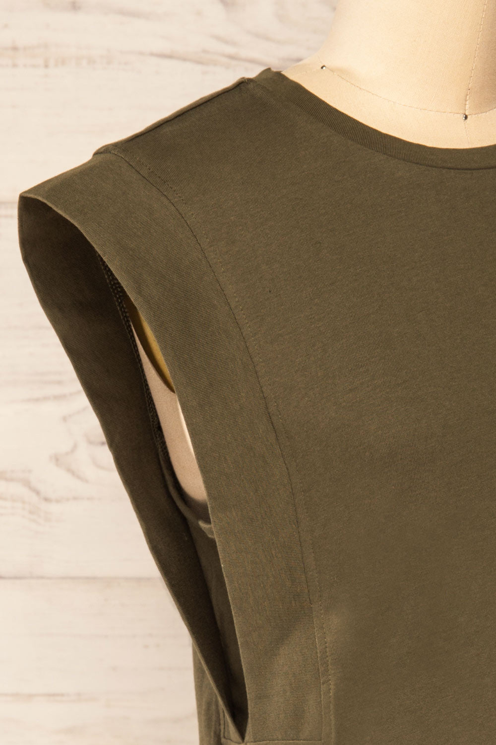 Vakan Green Round Collar Sleeveless Top | La petite garçonne side close-up