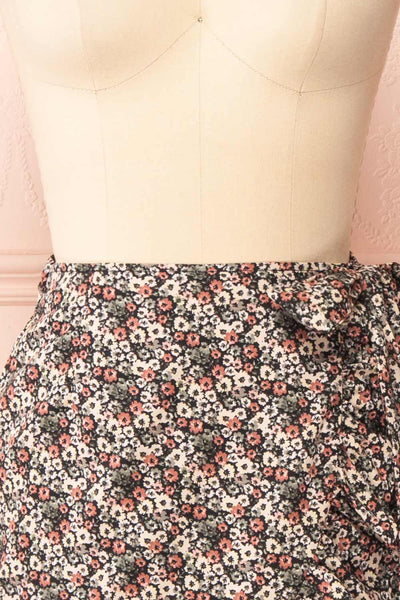 Varinia Black Patterned Ruffle Short Wrap Skirt | Boutique 1861  front close-up
