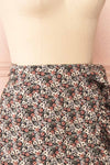 Varinia Black Patterned Ruffle Short Wrap Skirt | Boutique 1861  side close-up