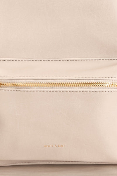 Voasa Grey Vegan Leather Backpack | La petite garçonne logo close-up