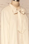 Wijchen Beige Button-Up Shirt w/ Tie Collar side close up | La Petite Garçonne