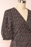 Xinqian Black Floral Wrap Dress w/ Puffy Sleeves | Boutique 1861 side close up