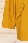Xito Mustard Raincoat w/ Waist Drawstring | La petite garçonne sleeve close-up
