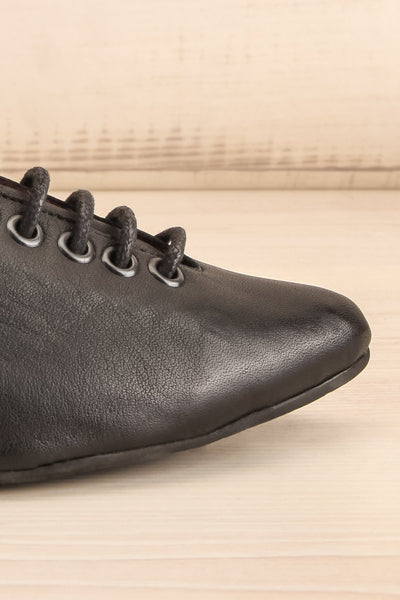 Yaqeta Black Flat Pointed Toe Shoes w/ Laces | La petite garçonne side front close-up