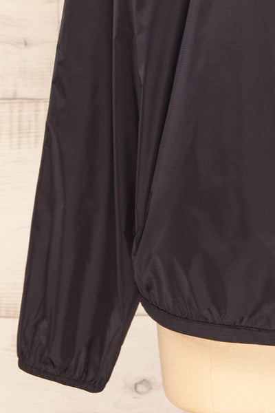 Zamora Black Packable Rain Jacket | La petite garçonne bottom